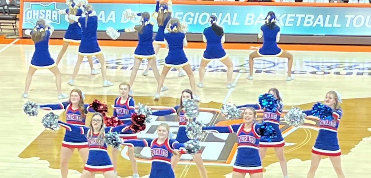 Cheerleaders pump up the crowd at OHSAA Regional Basketball game